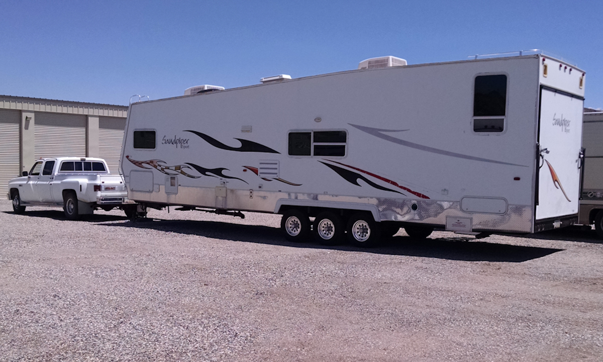 2006 34' Forest River Sandpiper Sport SP34T towed by 1982 GMC 454 ci 1-ton dually